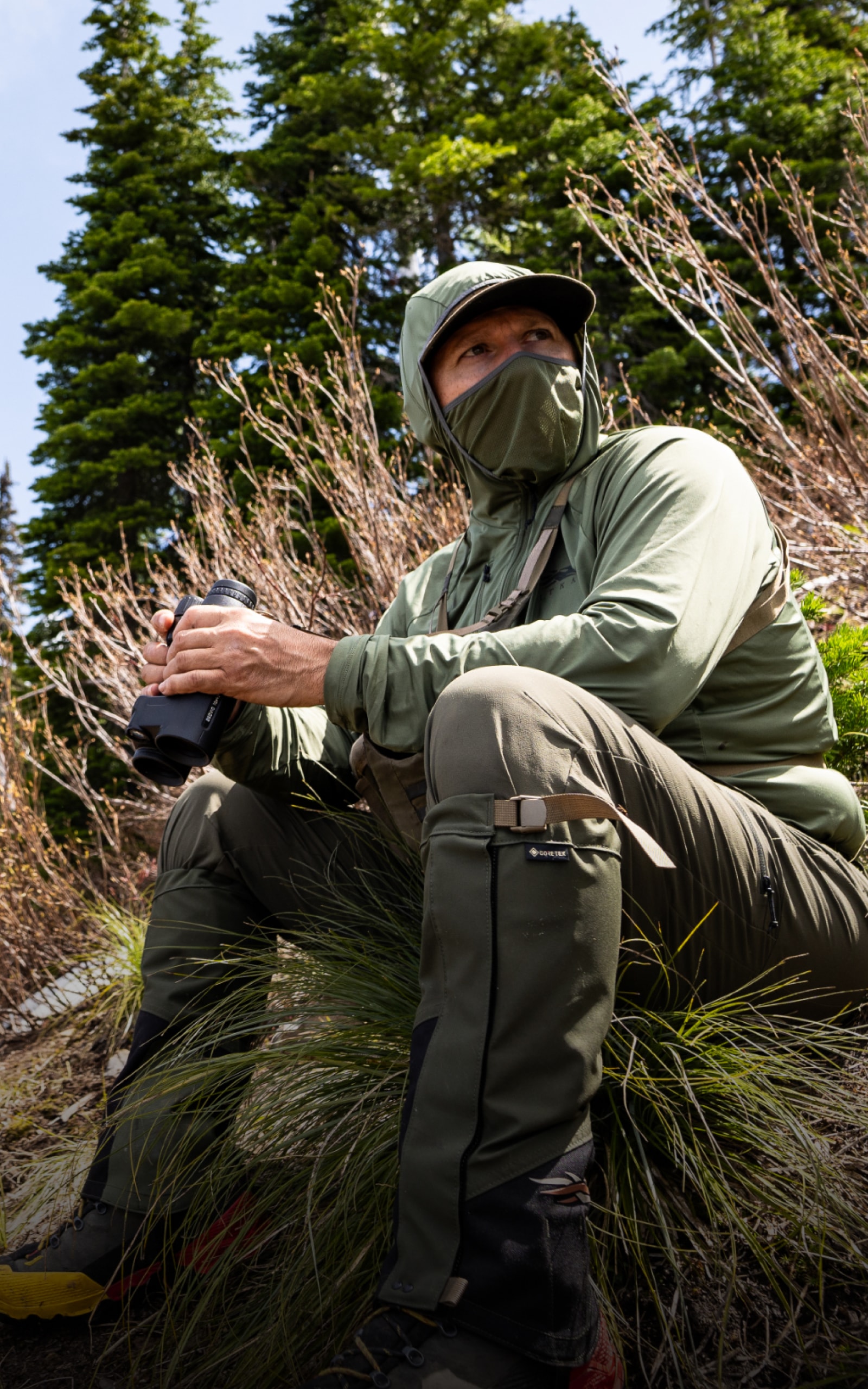 Josh Boyd fighting off the insects with ease in the Equinox Guard Hoodie in Covert | SITKA Gear