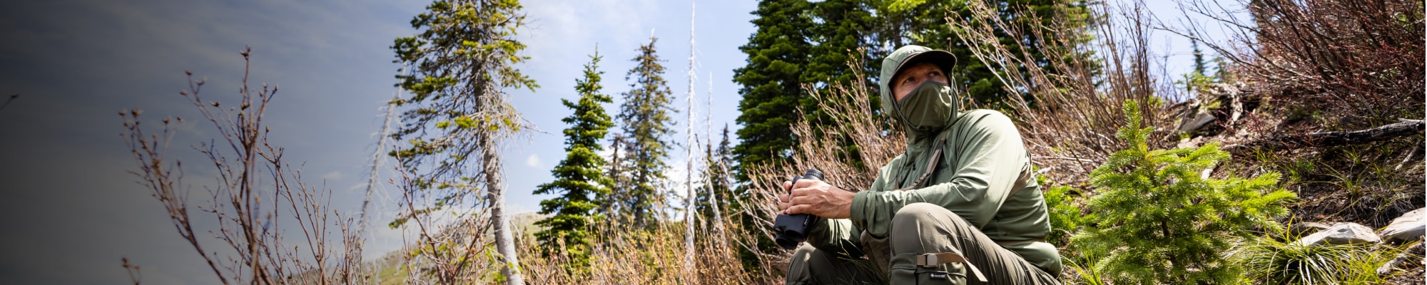 Josh Boyd fighting off the insects with ease in the Equinox Guard Hoodie in Covert | SITKA Gear